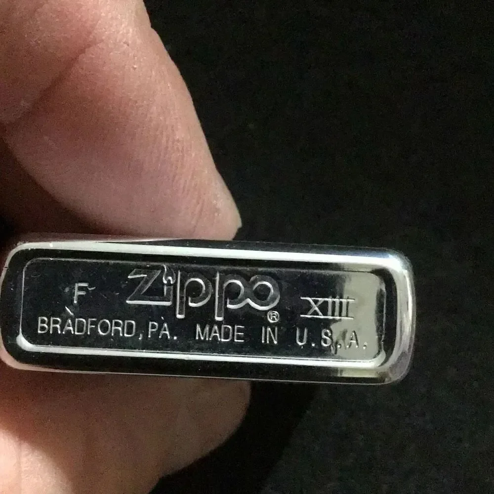 Zippo F-Xllll candle striker needs flint